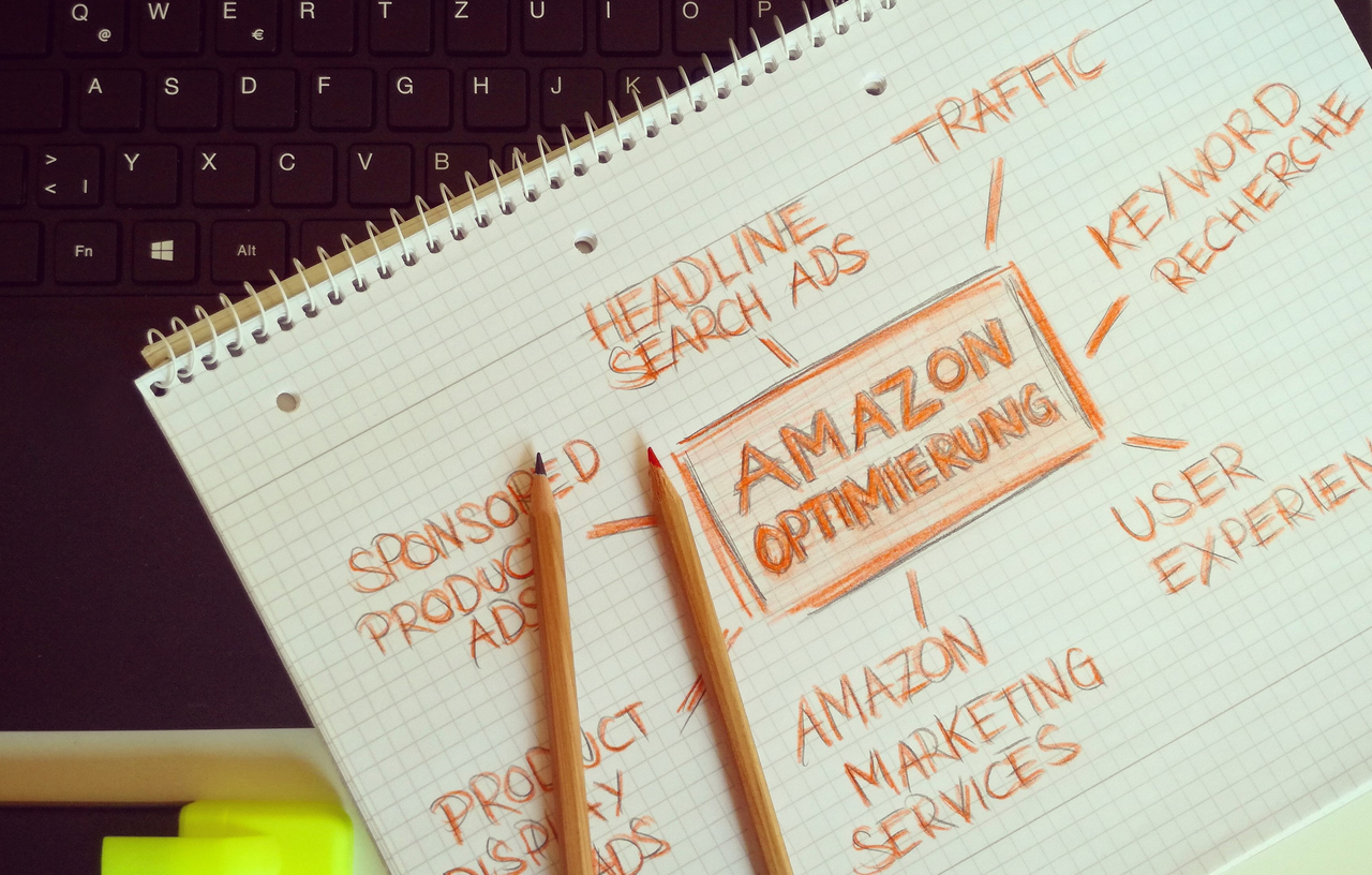 team-03 Visual representation of Amazon optimization techniques with handwritten notes and pencils.